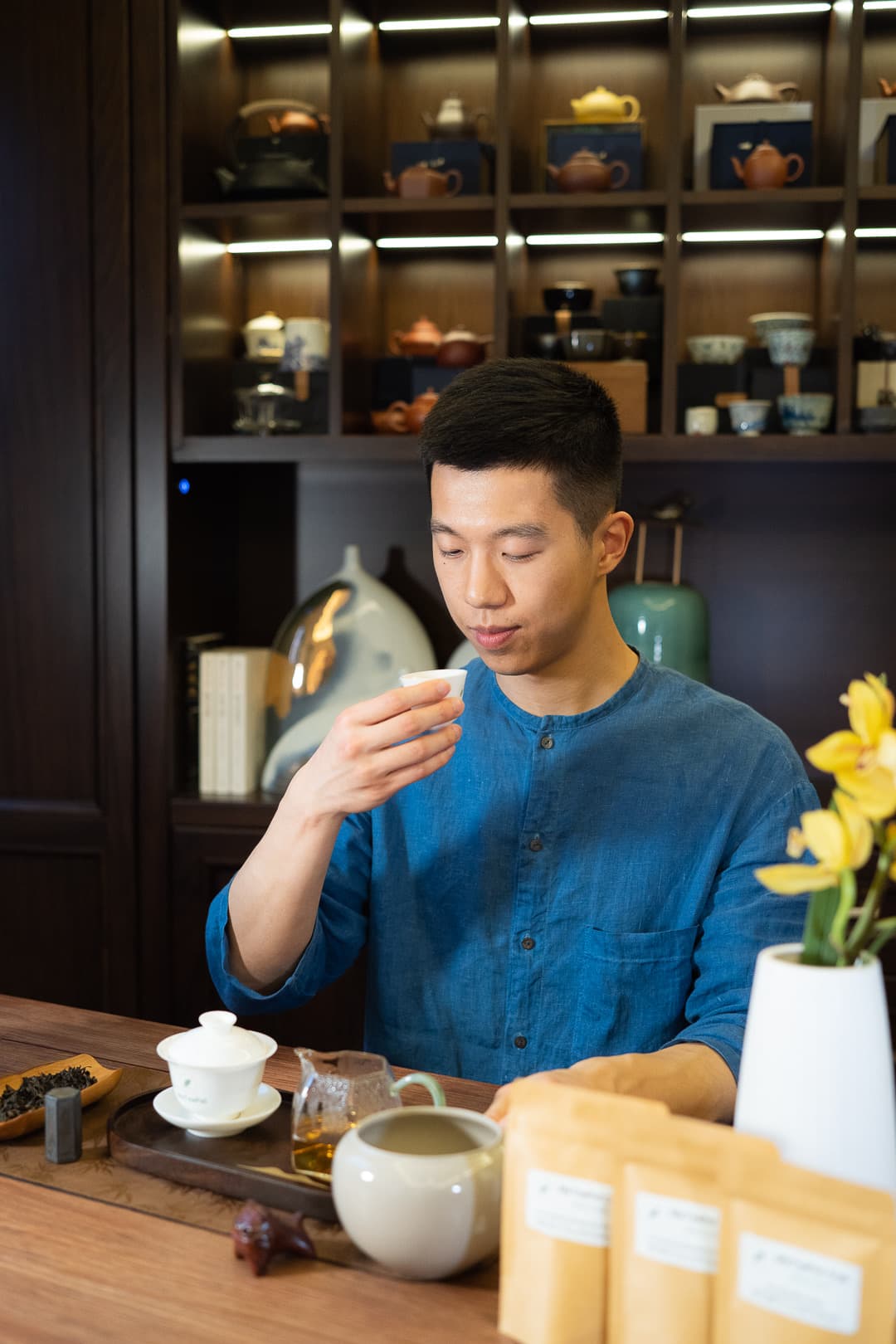 Vincent Liu smelling tea in his tearoom